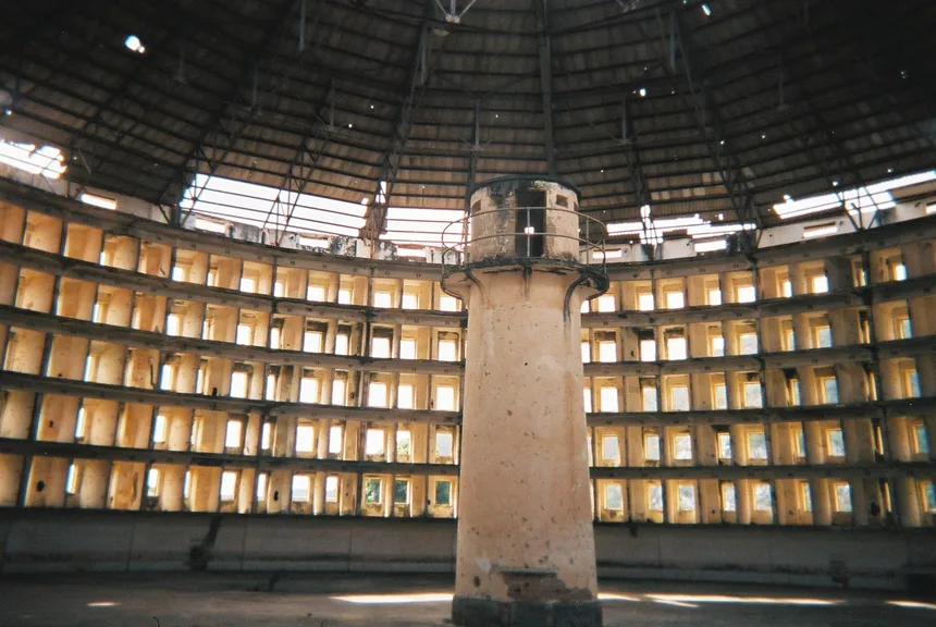 Interior of Presidio Modelo, with a central watchtower surrounded by circular tiers of cells